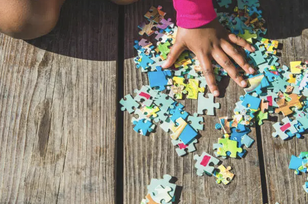 Child playing with puzzle