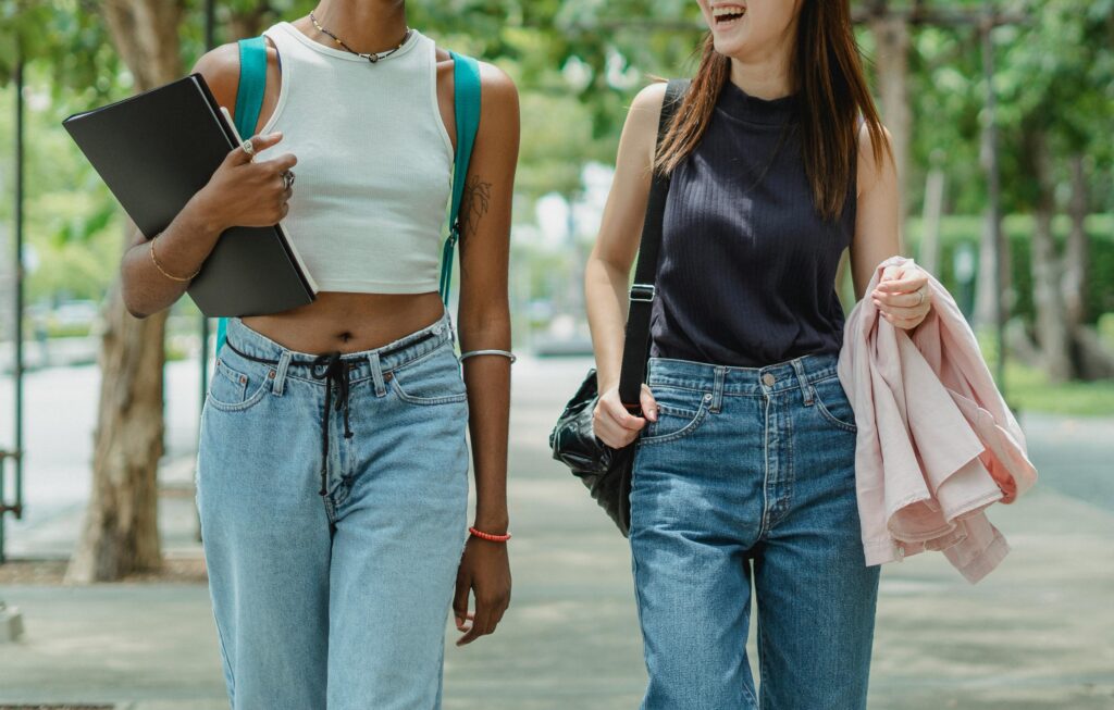 Two students enjoying a walk